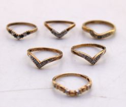 Selection of Six 9ct Gold Diamond and Cubic Zirconia Wishbone Rings.  There are Five Diamond