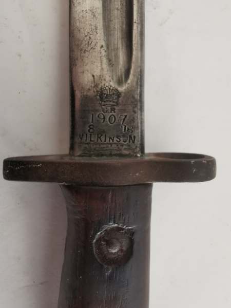 A First World War bayonet with a Wilkinson Blade dated 1907, with leather sheath. (1) - Image 2 of 2