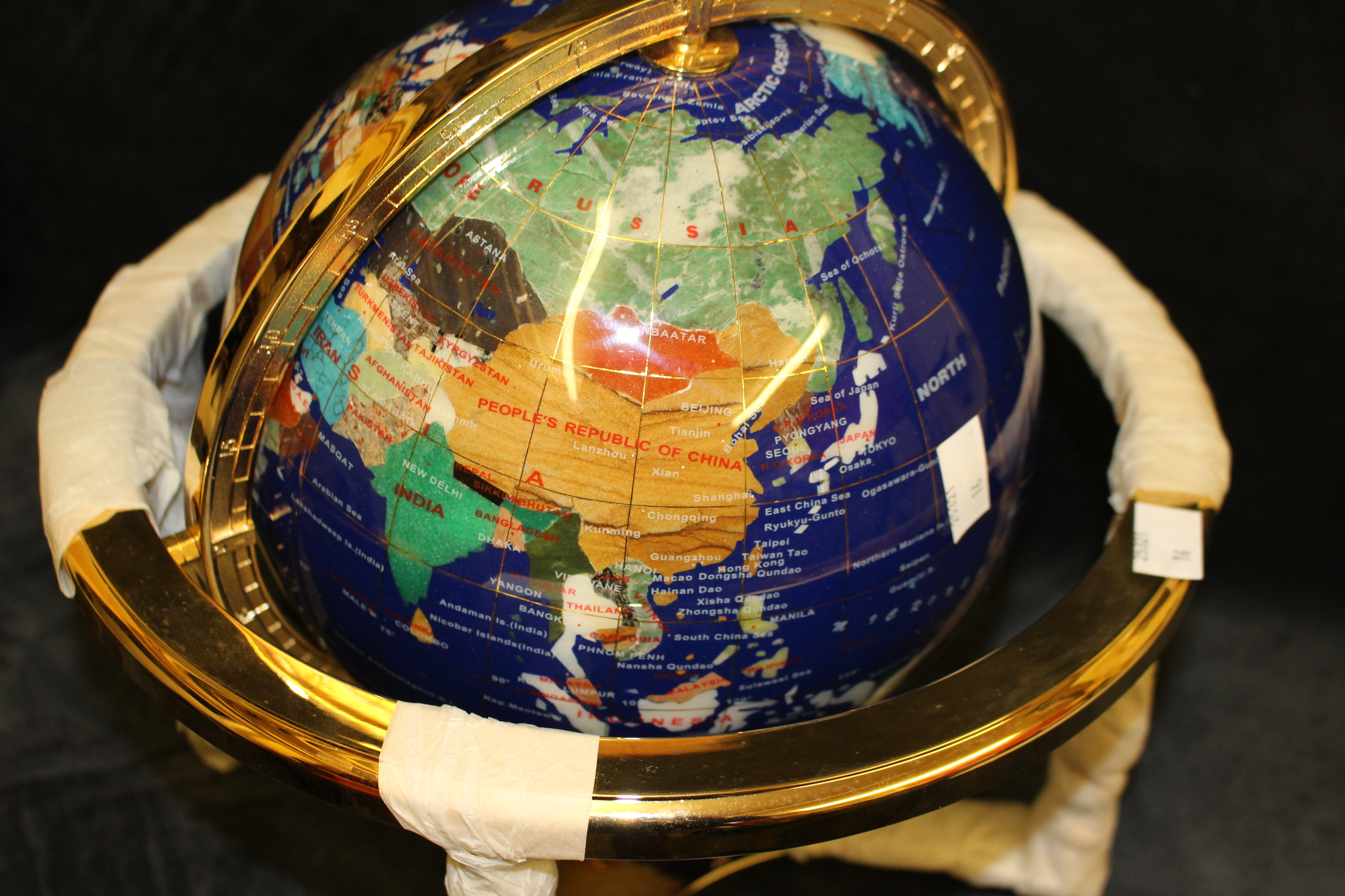 An Iccy co ltd specimen stone terrestrial table globe, gimbal mounted  on gilt metal stand, boxed - Image 2 of 3