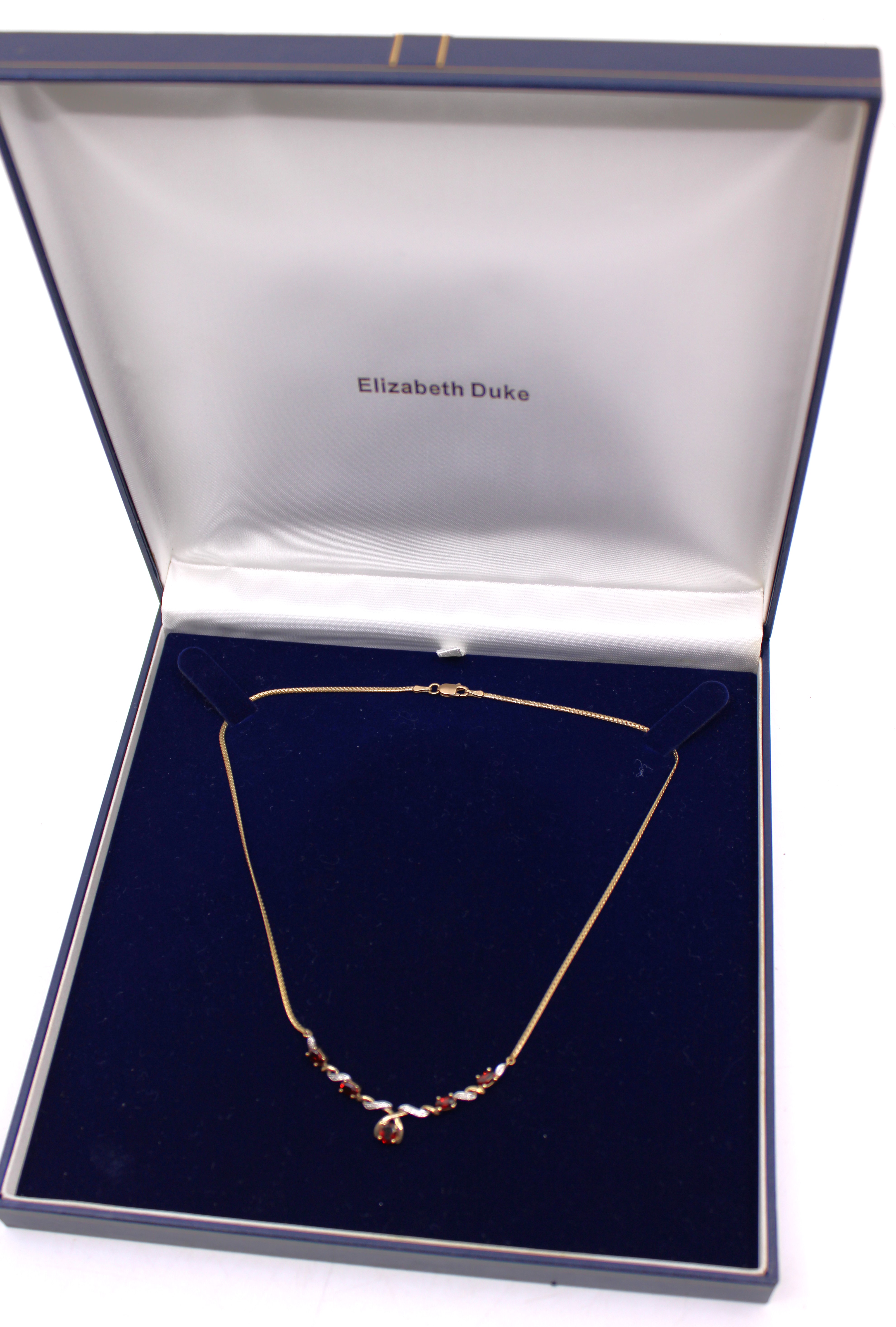 9ct Gold Garnet & Diamond Necklace.  The Necklace contains five Oval Brilliant Cut Garnets.  The - Image 3 of 3