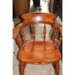 A circa 1900 oak smokers bow/ captains chair. (1)