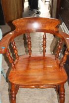 A circa 1900 oak smokers bow/ captains chair. (1)