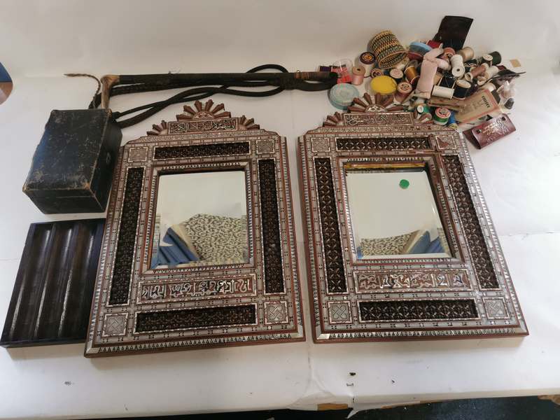 A pair of mother of pearl inlaid Islamic art mirrors, some damage to decoration, over all each