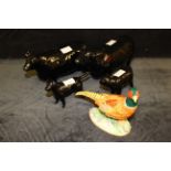 A Beswick black bull and cow printed marks "approved by the Aberdeen Angus society", a Beswick black