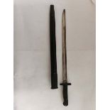 A First World War bayonet with a Wilkinson Blade dated 1907, with leather sheath. (1)