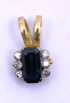 18ct Yellow Gold Sapphire and Diamond Pendant.  The Rectangular Step Cut Sapphire measures approx.