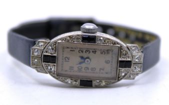 Art Deco Unmarked White Metal Diamond Dress/Cocktail Mechanical watch.  The watch contains six melee
