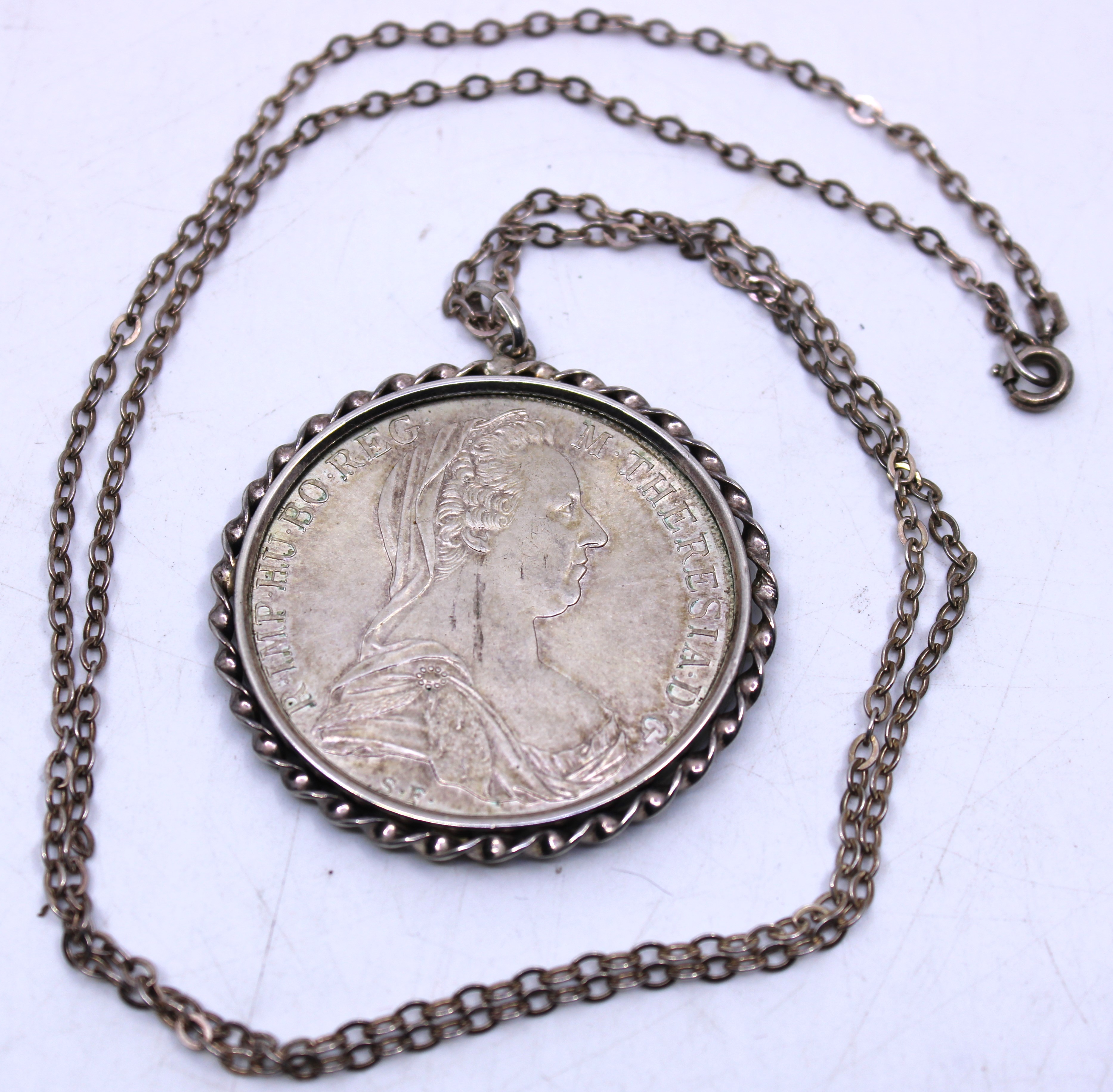 Maria Theresa 1780 Thaler Re-strike Coin Pendant on a Silver Chain.  An impressive size Coin Pendant