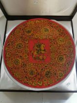 Large Paper Mache Plate. 50cm in diameter. Decorated with Knight on Horseback slaying a Dragon