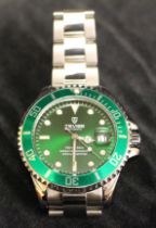 A Tevise Men's Quartz Automatic Watch with Stainless Steel Strap Green Dial and a Retro Chrome
