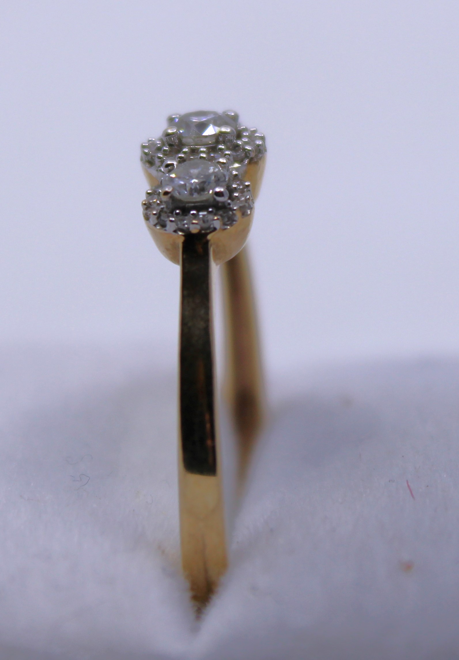 9ct Yellow Gold Three Stone Round Brilliant Cut Diamond ring with surrounding Round Brilliant Cut - Image 3 of 3