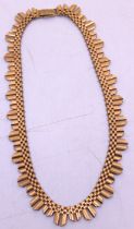 9ct Yellow Gold Necklace with adjustable safety fastening. There is bark effect pattern.  The