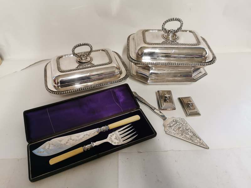 A collection of silver plated items to include; a pair of old Sheffield plated entre dishes