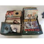 2 boxes of vintage records to include records by; Blondie, Guns & Roses, Simon And Garfunkel and