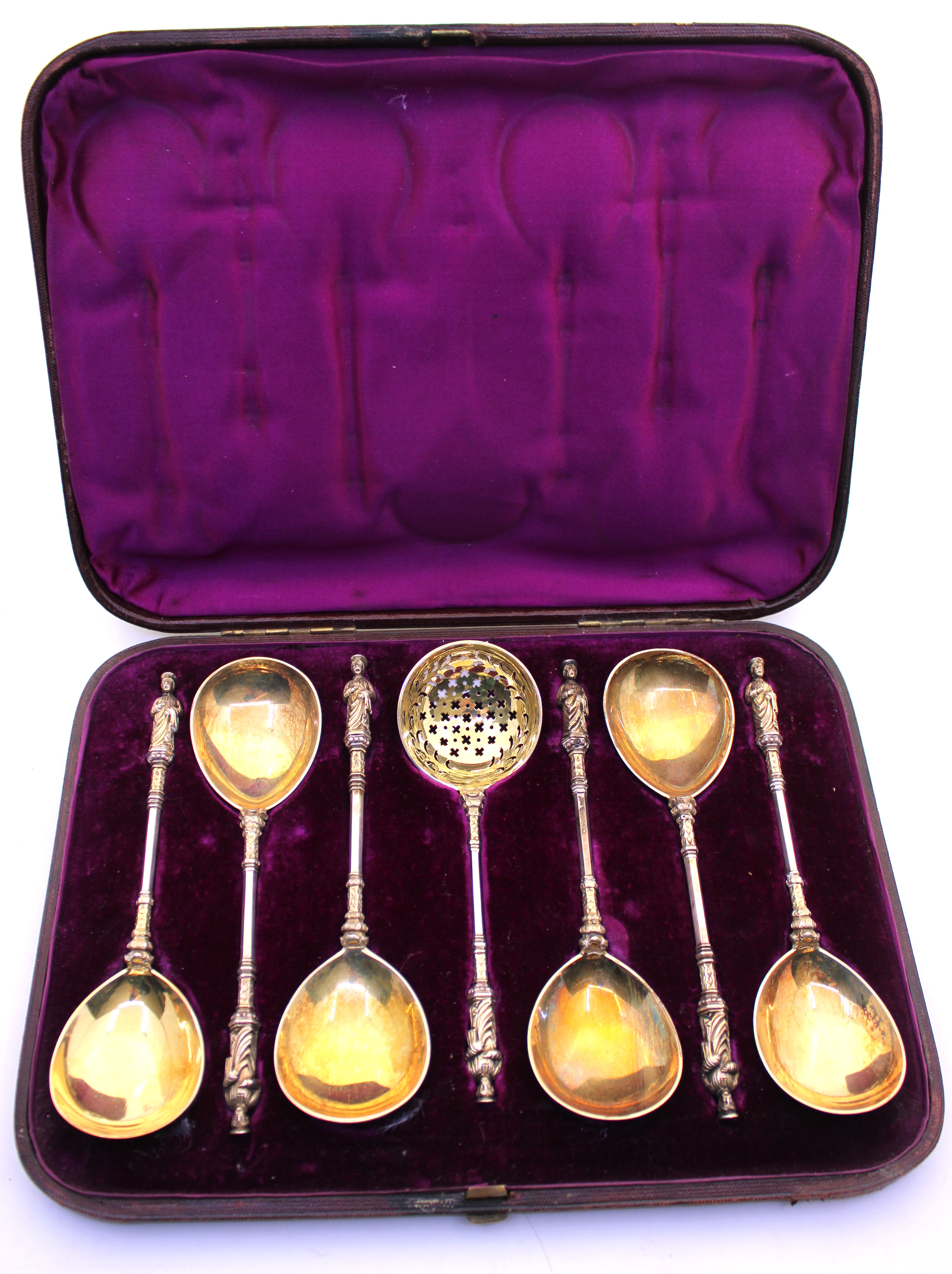 Six Victorian Sterling Silver-Gilt Apostle Spoons and a Sifter Spoon.  They are hallmarked with