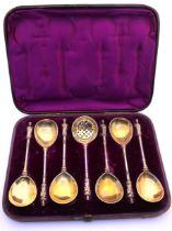 Six Victorian Sterling Silver-Gilt Apostle Spoons and a Sifter Spoon.  They are hallmarked with