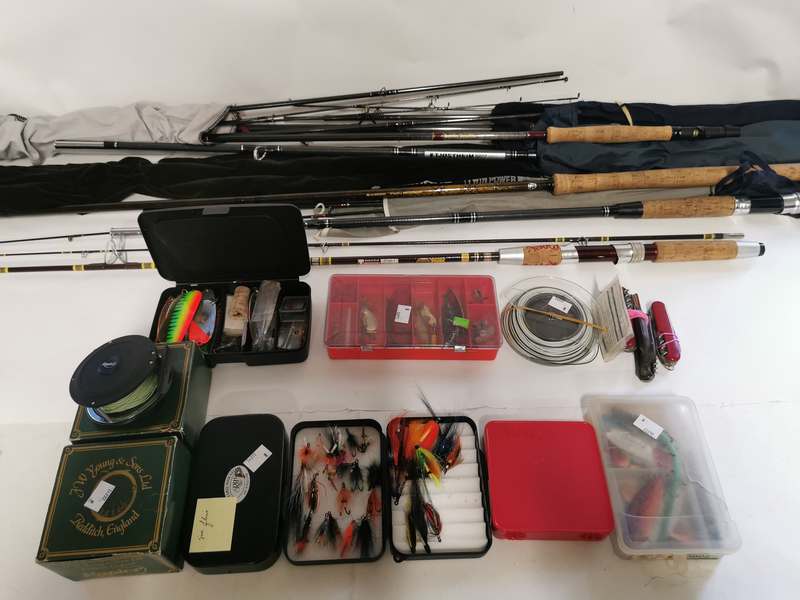 A collection of vintage fly fishing equipment to include; flys, spinners, pocket knives, 2 centre