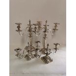 A pair of two branch Sheffield plated candelabra, approximately 14'' high. Together with a shorter