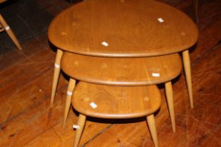 Ercol Blonde pebble coffee table.