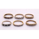 Selection of Six 9ct Gold Dress Rings.  Most of the rings contain Cubic Zirconia stones.  Ring Sizes