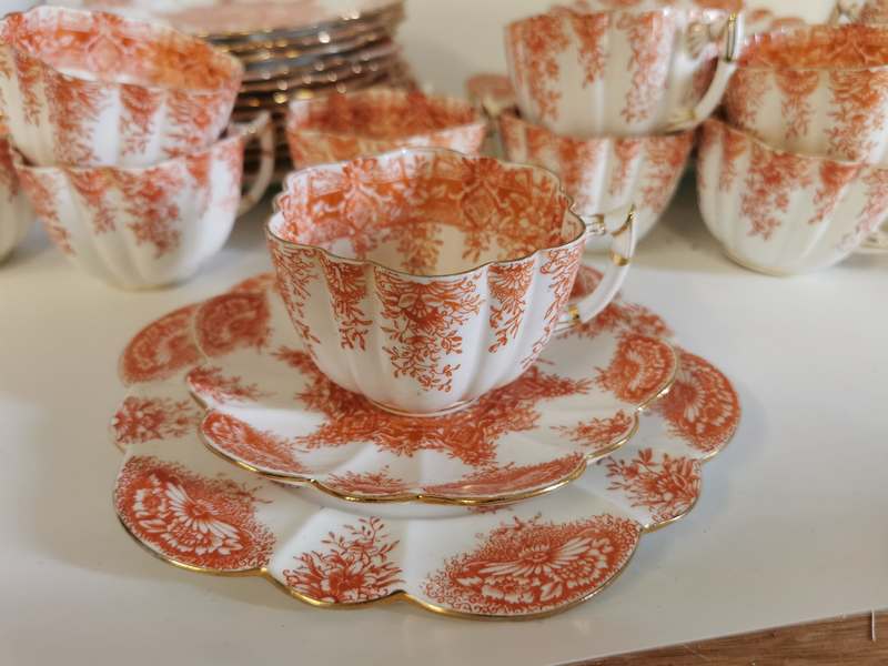 An Orange and white Victorian china tea set by Foley China, RD 115510 with a fluted body. 11 trios - Image 2 of 3