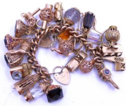 Chunky 9ct Rose Gold Bracelet with Twenty Five 9ct Gold and Unmarked Yellow Metal charms and