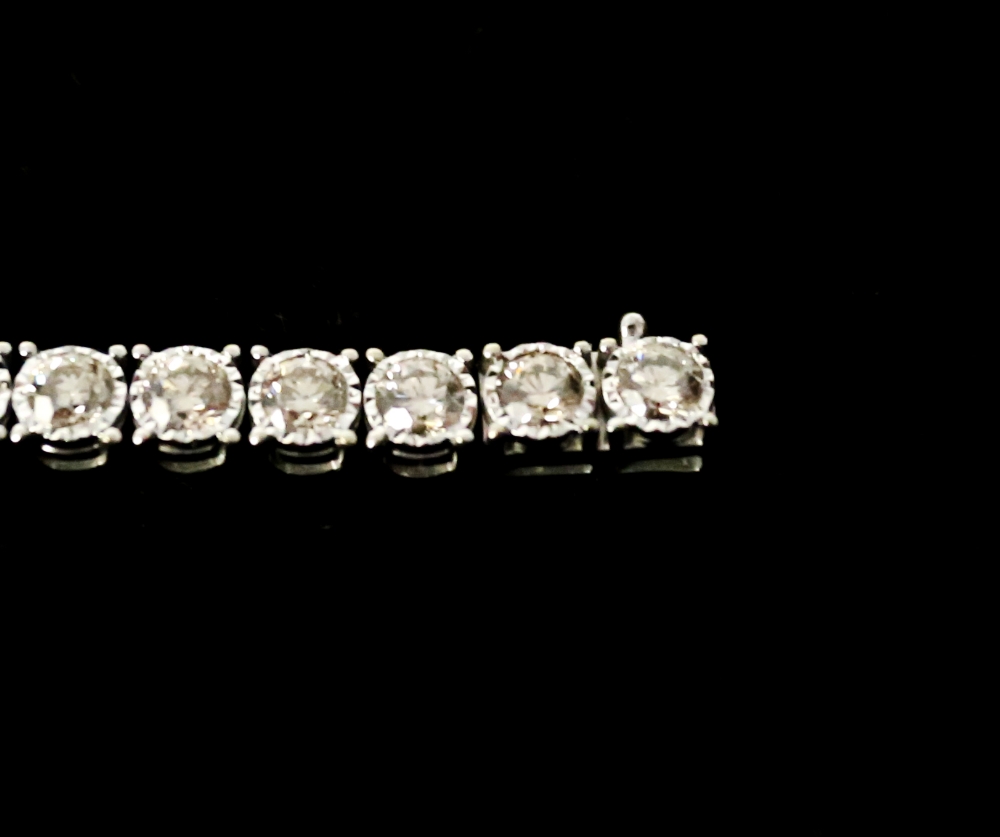 A diamond set 9ct white gold tennis bracelet, comprising forty round brilliant cut diamonds, total - Image 4 of 9
