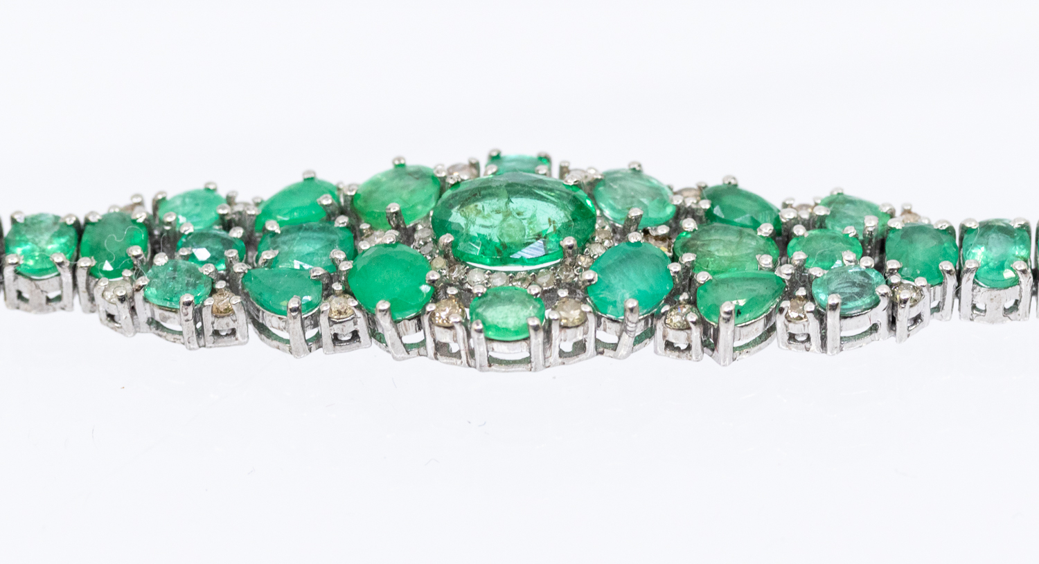 An emerald and diamond set silver bracelet set with oval and pear cut emeralds with diamond set - Image 4 of 5