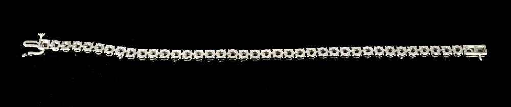 A diamond set 9ct white gold tennis bracelet, comprising forty round brilliant cut diamonds, total - Image 5 of 9
