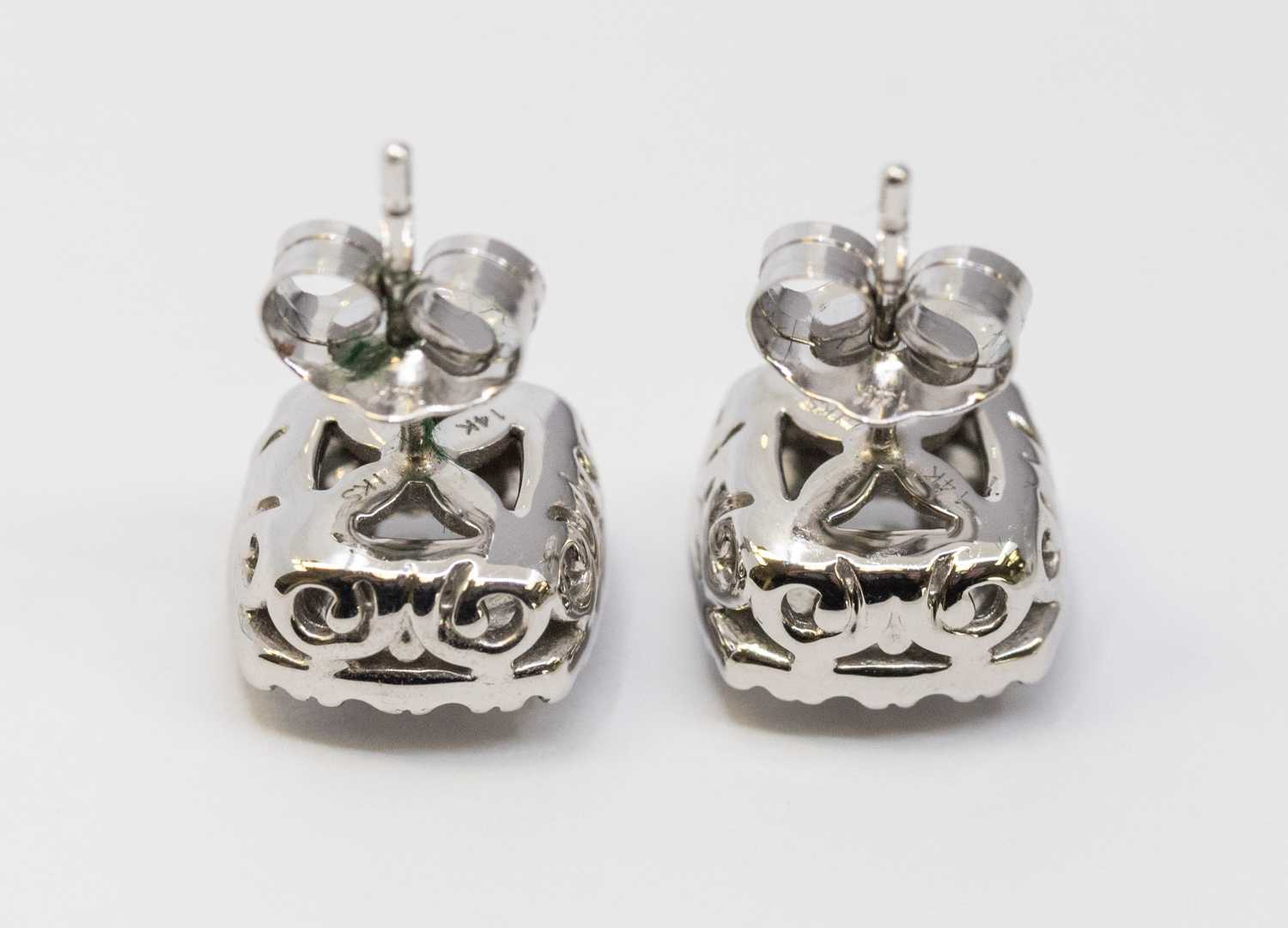 A pair of diamond and 14ct white gold cluster earrings, comprising cushion shaped mount claw set - Image 2 of 3