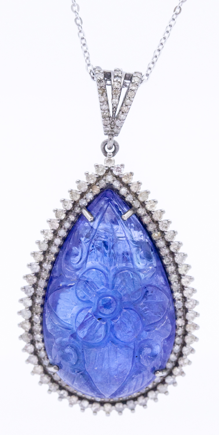 A large tanzanite and diamond set silver pendant, comprising a carved pear shaped tanzanite, total - Image 4 of 4