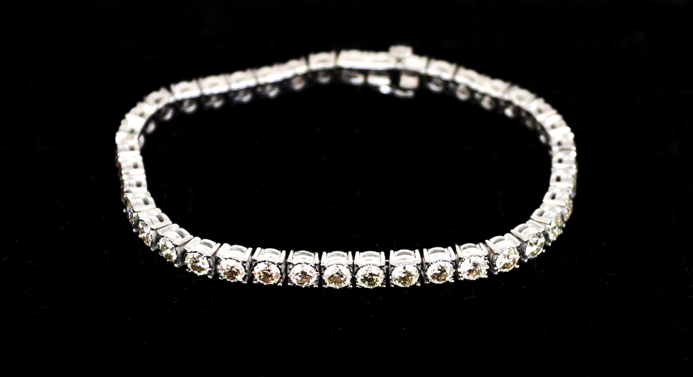 A diamond set 9ct white gold tennis bracelet, comprising forty round brilliant cut diamonds, total - Image 8 of 9