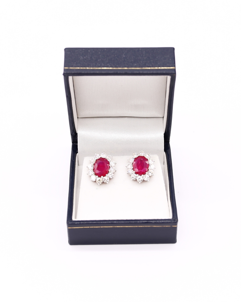 A pair of ruby and diamond set 18ct white gold oval cluster studs, rubies weighing a total of approx - Image 2 of 5