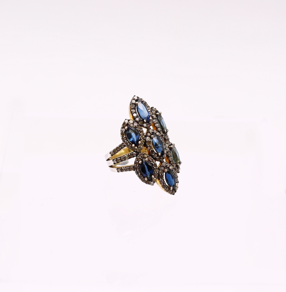 A large sapphire and diamond set silver gilt ring, set with marquise cut sapphires within diamond - Image 2 of 4