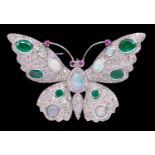 An Art Nouveau style opal, diamond, emerald and ruby silver pendant/brooch and pendant in silver,