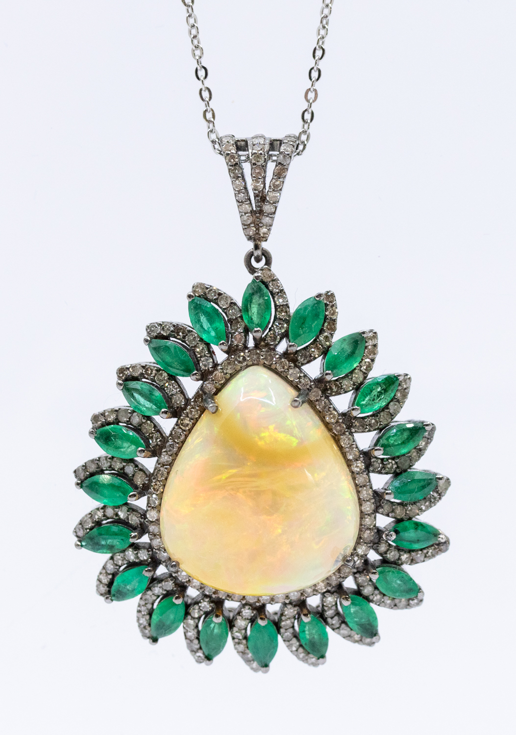 A large opal, emerald and diamond set pearl shaped silver pendant, comprising a pearl shaped opal to - Image 2 of 3