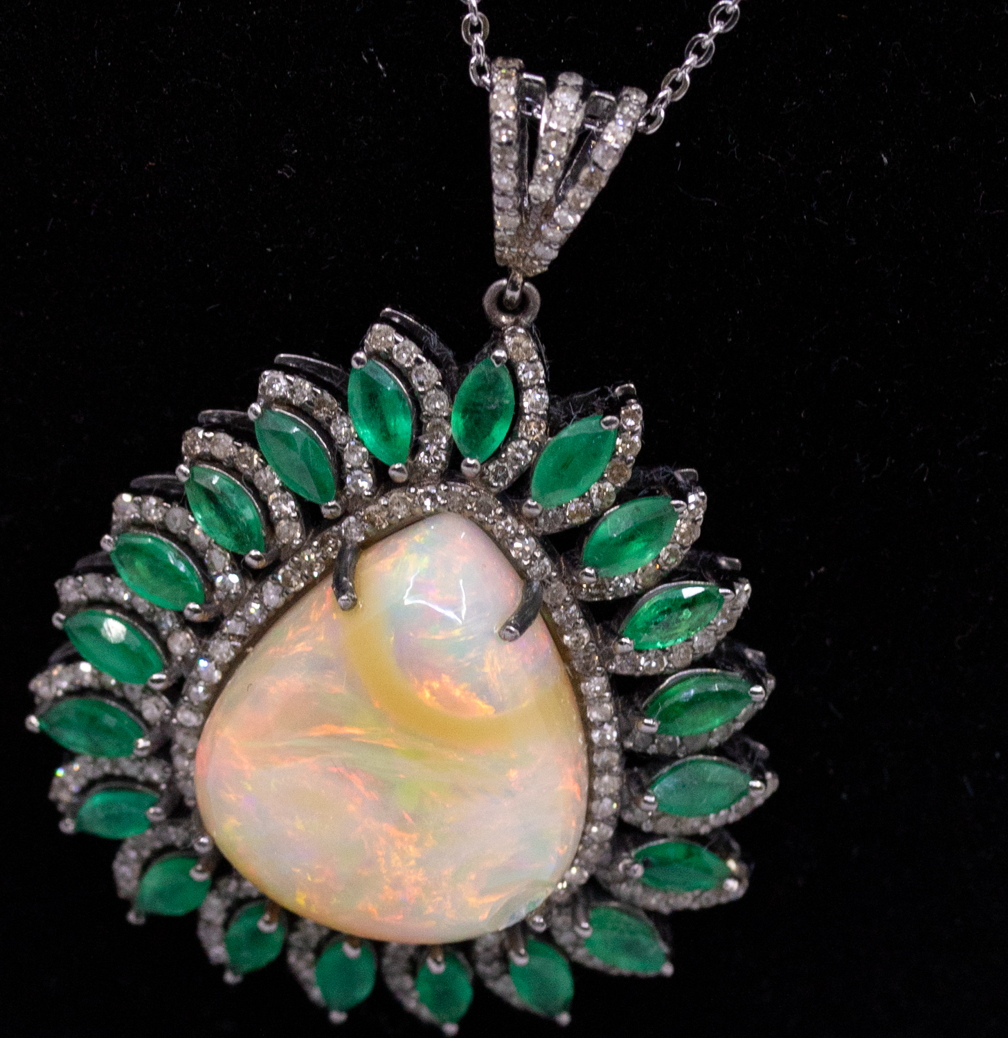 A large opal, emerald and diamond set pearl shaped silver pendant, comprising a pearl shaped opal to - Image 3 of 3