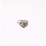 A diamond set 9ct white gold halo cluster ring, set with round brilliant cut diamonds, total diamond