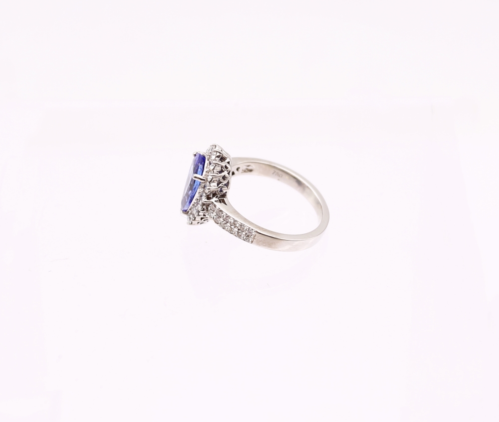 A tanzanite and diamond 8ct white gold ring, comprising a mixed pear-cut tanzanite, weighing - Image 3 of 6