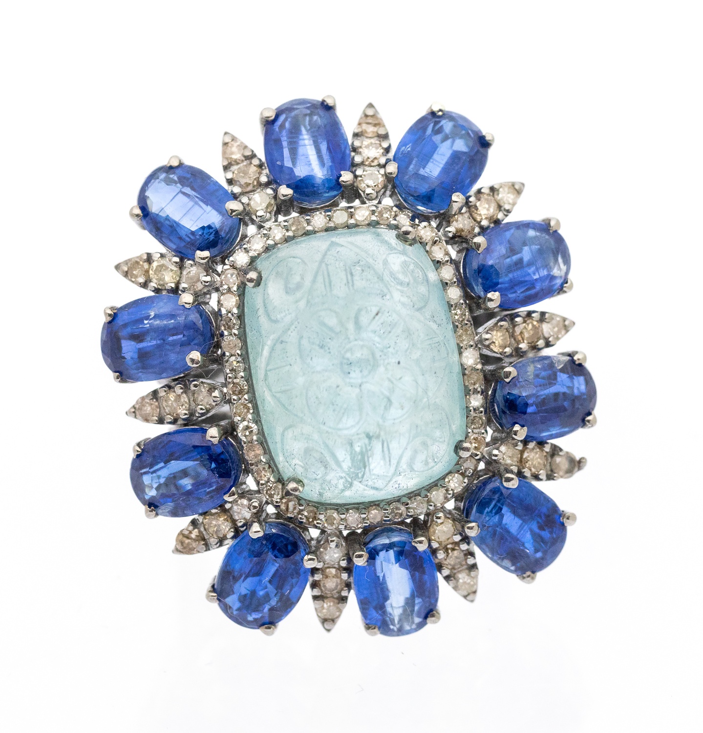 A large aquamarine, kyanite and diamond set white gold cocktail ring, comprising a central cushion