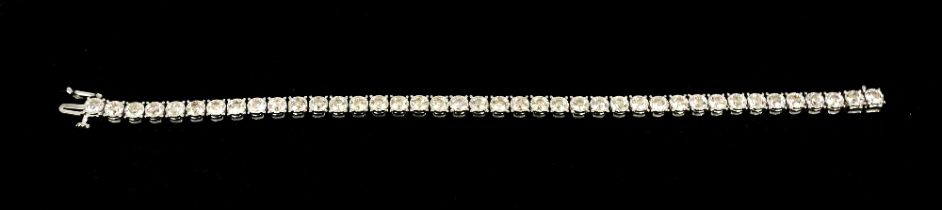 A diamond set 9ct white gold tennis bracelet, comprising forty round brilliant cut diamonds, total