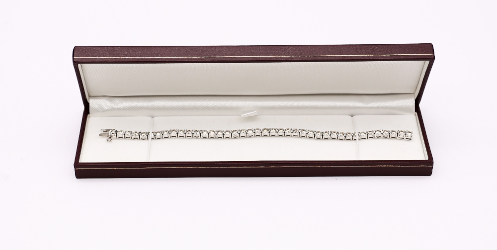 A diamond set 9ct white gold tennis bracelet, comprising forty round brilliant cut diamonds, total - Image 9 of 9