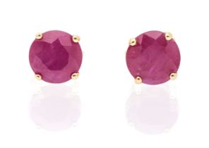 A pair of ruby and 18ct yellow gold stud earrings, claw set with with a round mixed cut rubies,
