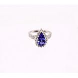 A tanzanite and diamond 8ct white gold ring, comprising a mixed pear-cut tanzanite, weighing