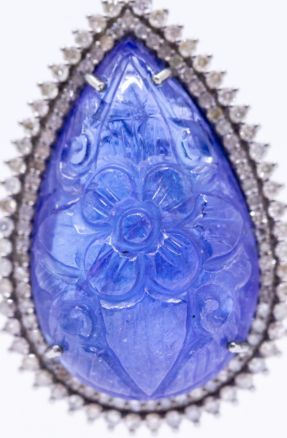 A large tanzanite and diamond set silver pendant, comprising a carved pear shaped tanzanite, total - Image 3 of 4