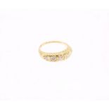 A vintage style diamond and 18ct yellow gold ring, comprising a row of five graduated round