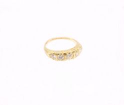 A vintage style diamond and 18ct yellow gold ring, comprising a row of five graduated round
