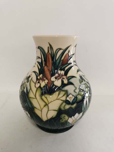 A Moorcroft Baluster shaped vase, Lamia Bullrush pattern, designed by Rachel Bishop. 24cm high, in