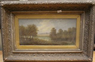 George Butler "River Landscape with trees"  Oil On Canvas. Signed lower left.  Set In heavy ornate