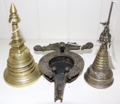 An Indian bronze temple bell, 15cm high, an Indian bronze Orissa oil lamp with bird finial,, 16cm